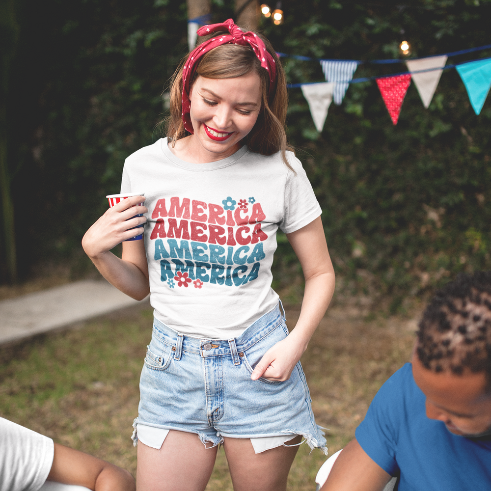 Show off your patriotic pride with this America Flower Retro Unisex Tee; it's the perfect way to celebrate Fourth of July or Memorial Day! With a fun retro flower design, it's made of soft and lightweight fabric that's comfy enough for all the stars, stripes, and summer fun. Get your red, white and blue on, American girl!